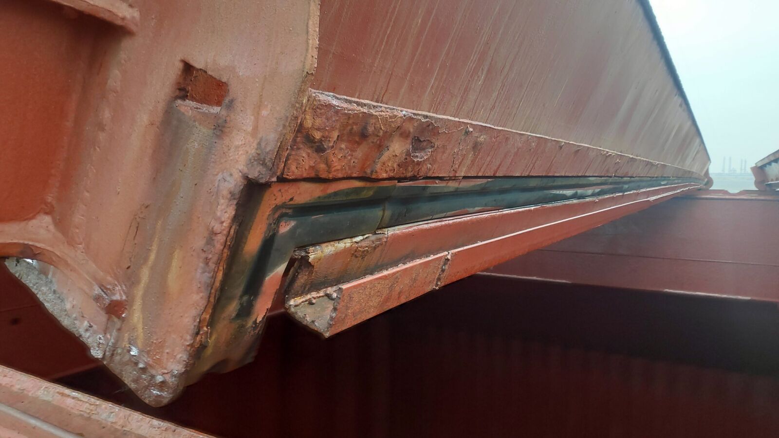 Hatch cover split joint, note condition of rubber seal and drain channel
