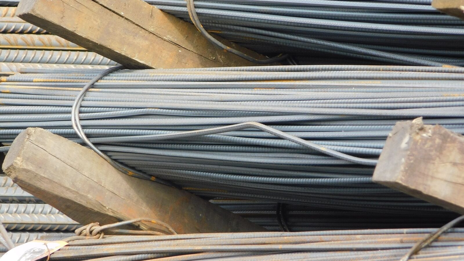 Bent along length steel reinforcing bars