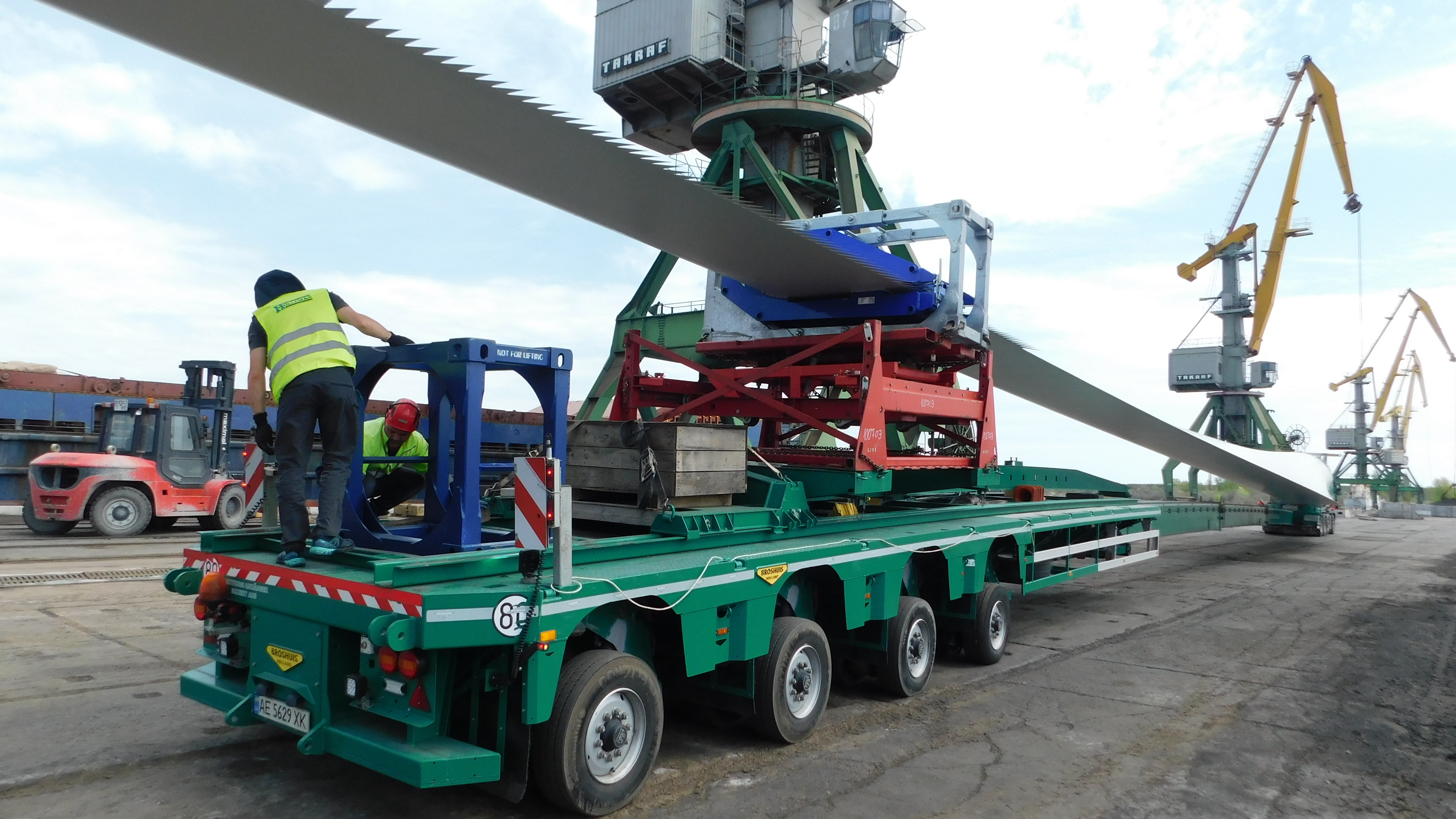 Project Cargo. Loading of wind turbine blade on truck platform