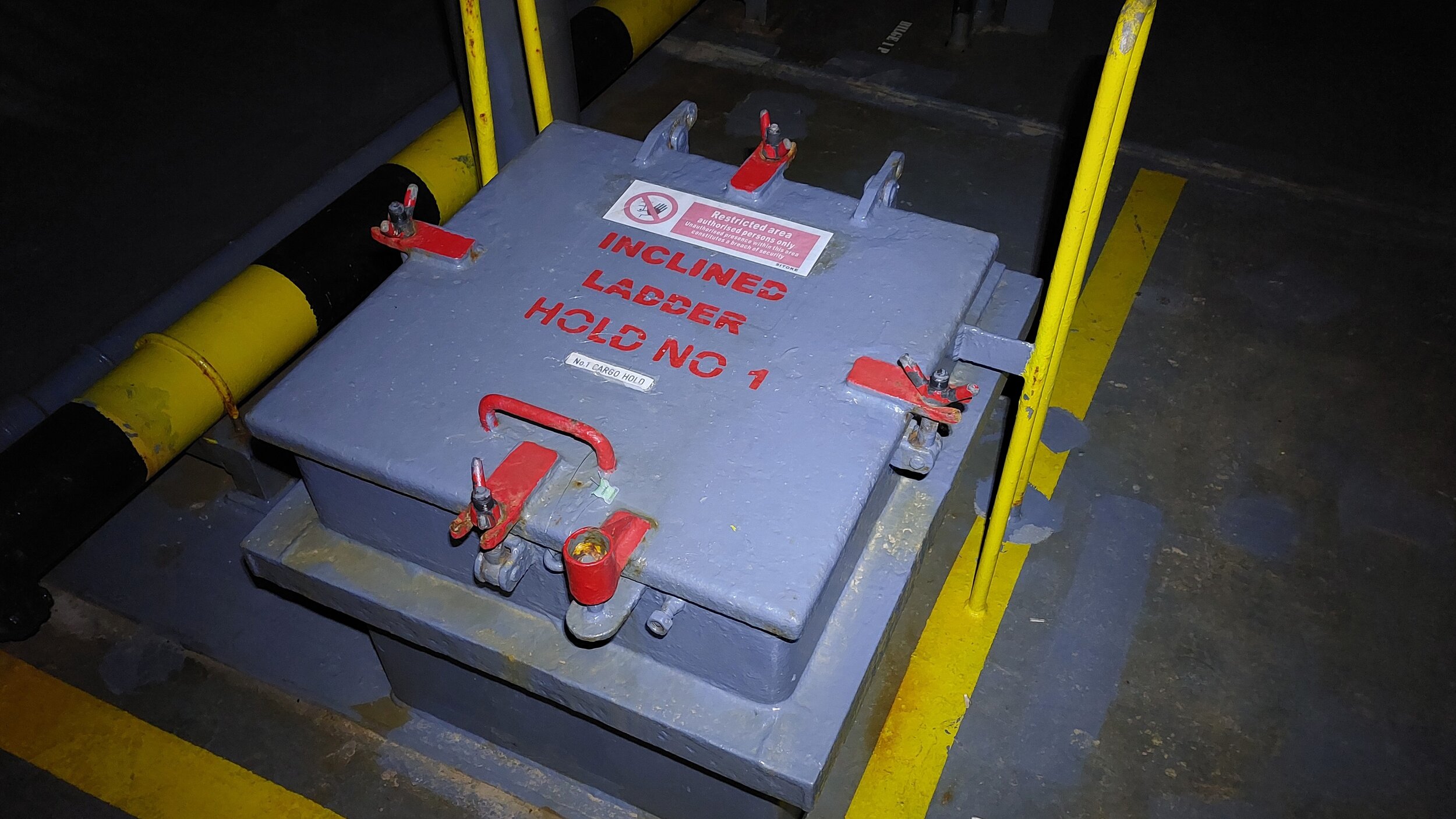 General view of manhole sealed by plastic numbered seal