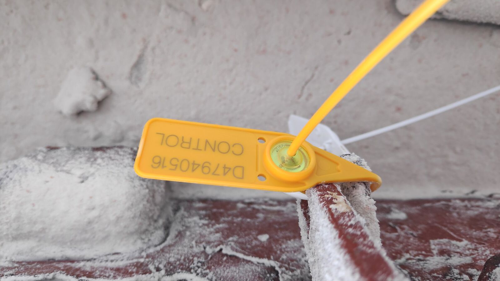 Sealing of manhole with plastic numbered seal