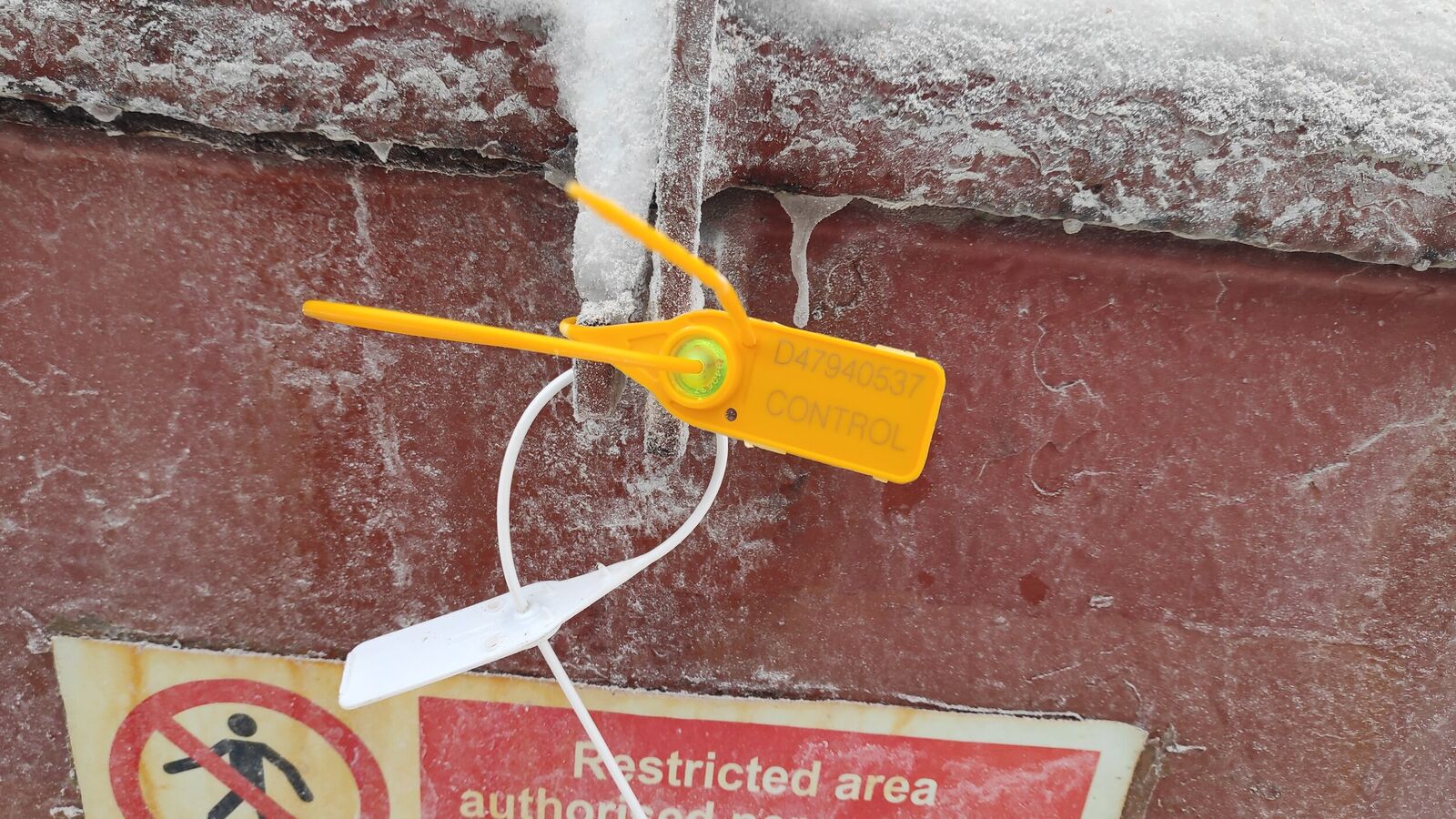 Manhole sealed with plastic numbered seal