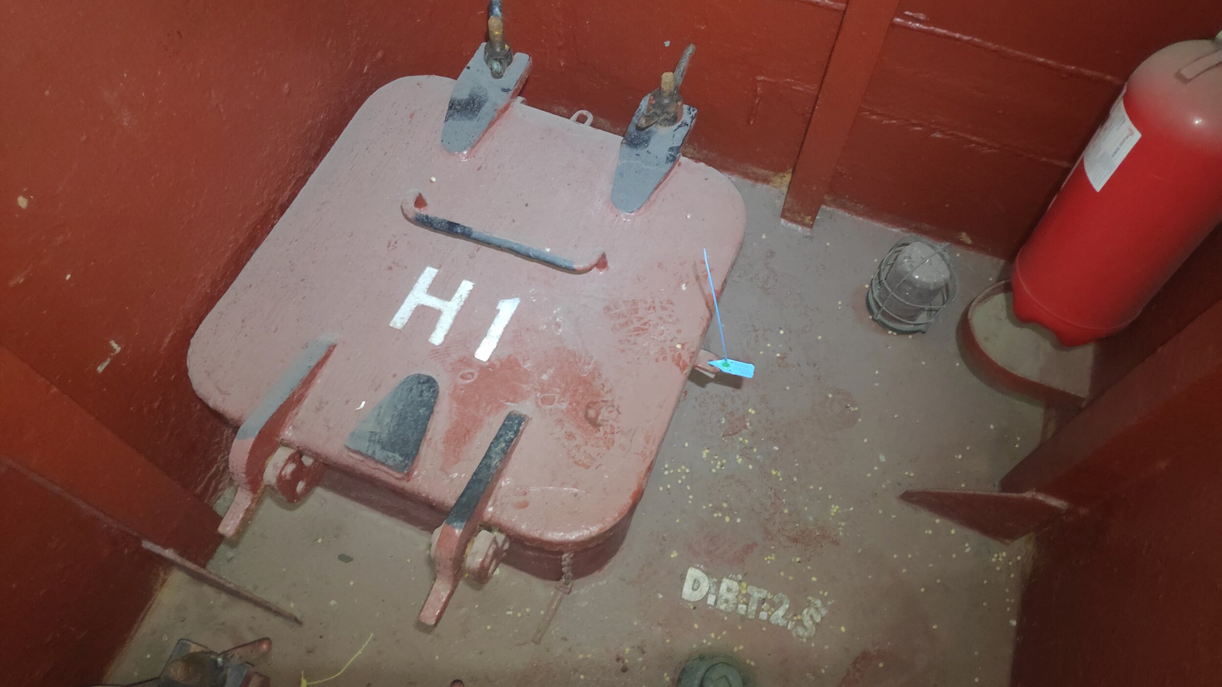 General view of manhole sealed by plastic numbered seal