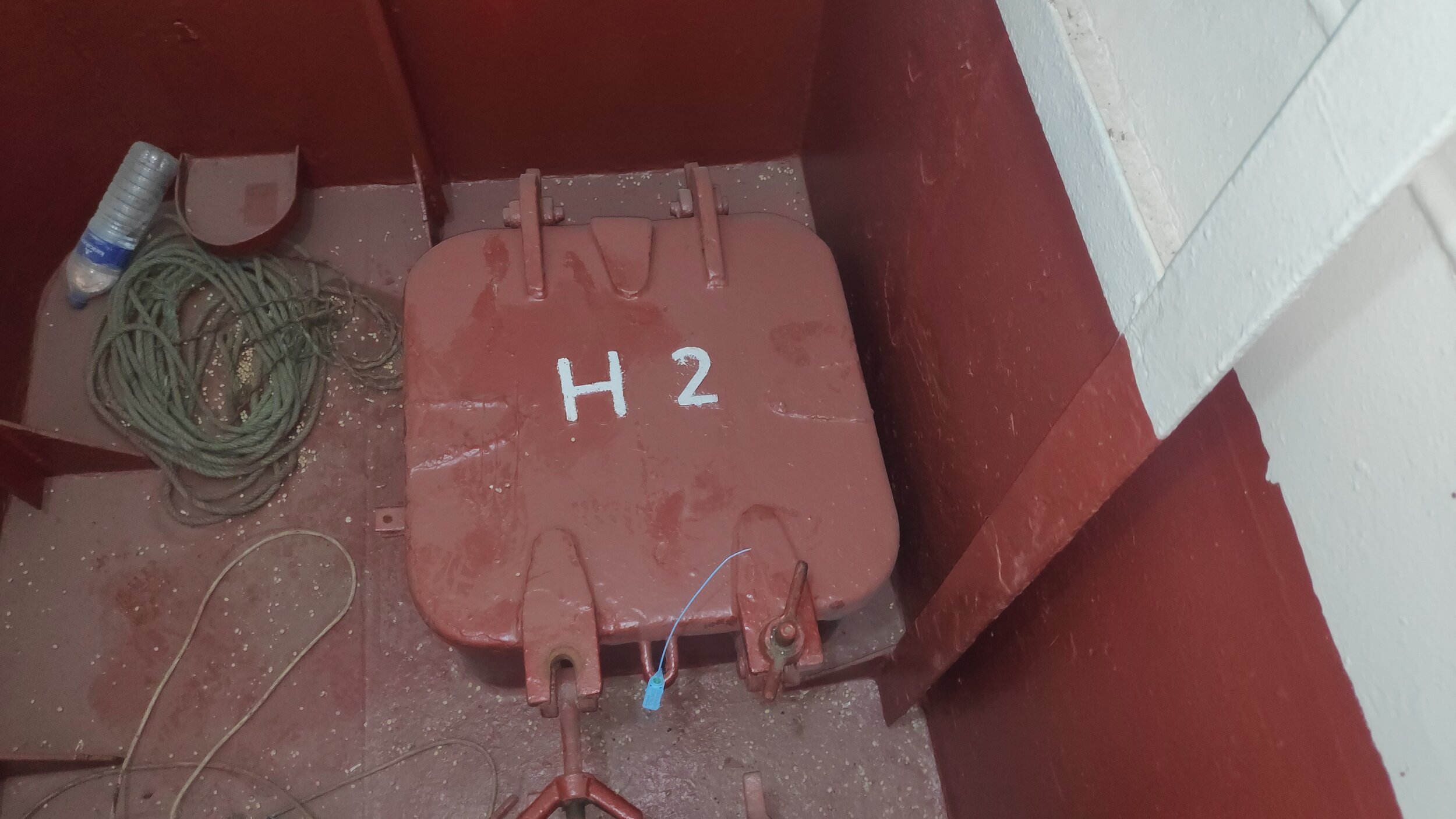 General view of manhole sealed by plastic numbered seal