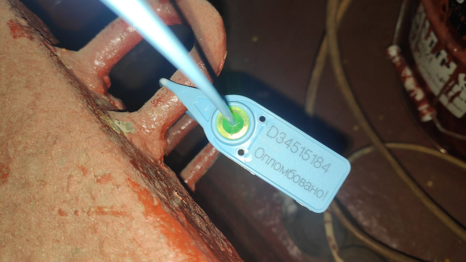 Manhole sealed by plastic numbered seal