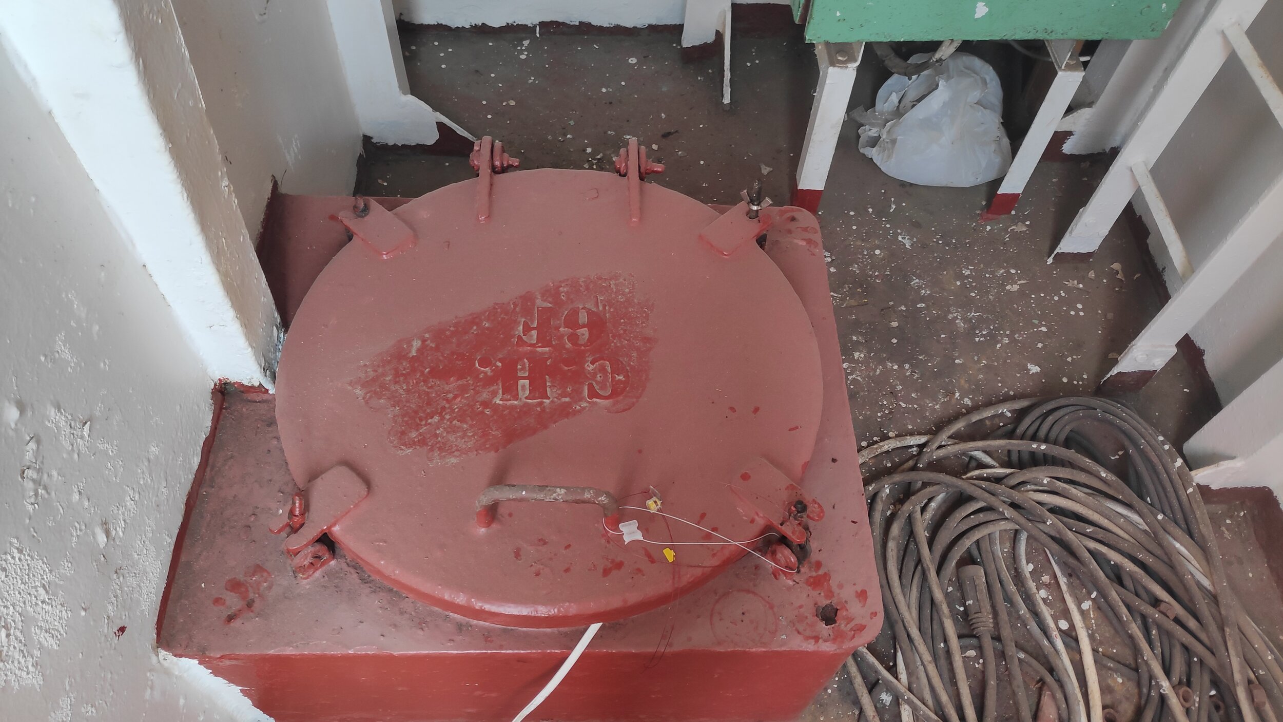 General view of manhole sealed by plastic numbered seal