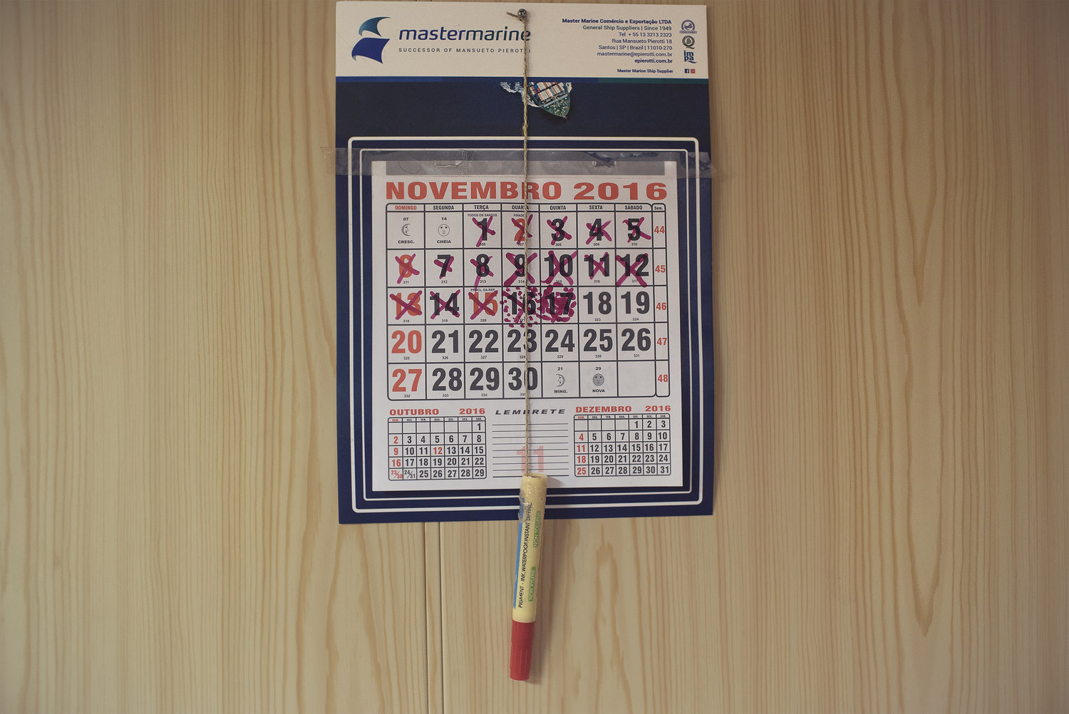 Crossed out dates on a wall calendar