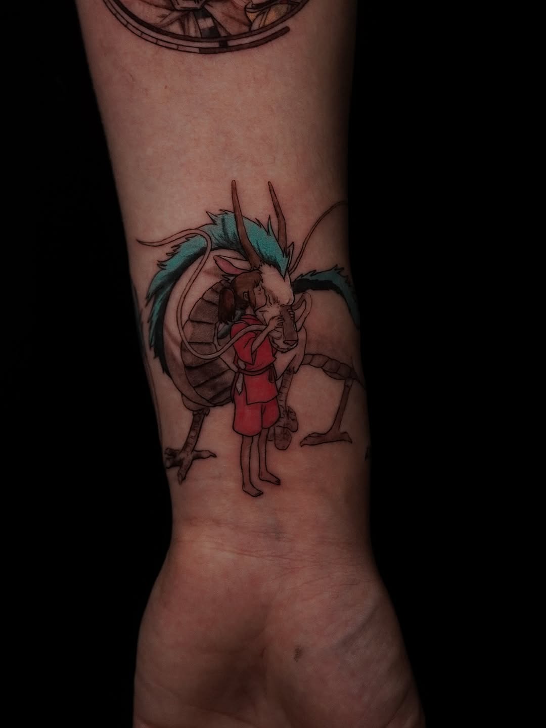 Spirited Away-inspired Chihiro and dragon on the wrist