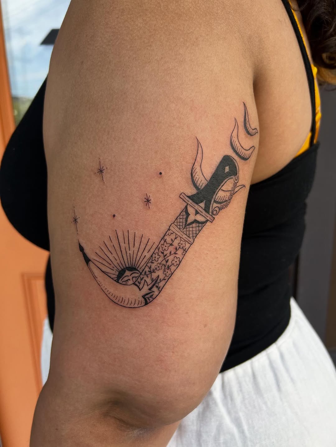 Blackwork kirpan with floral filigree and sunburst