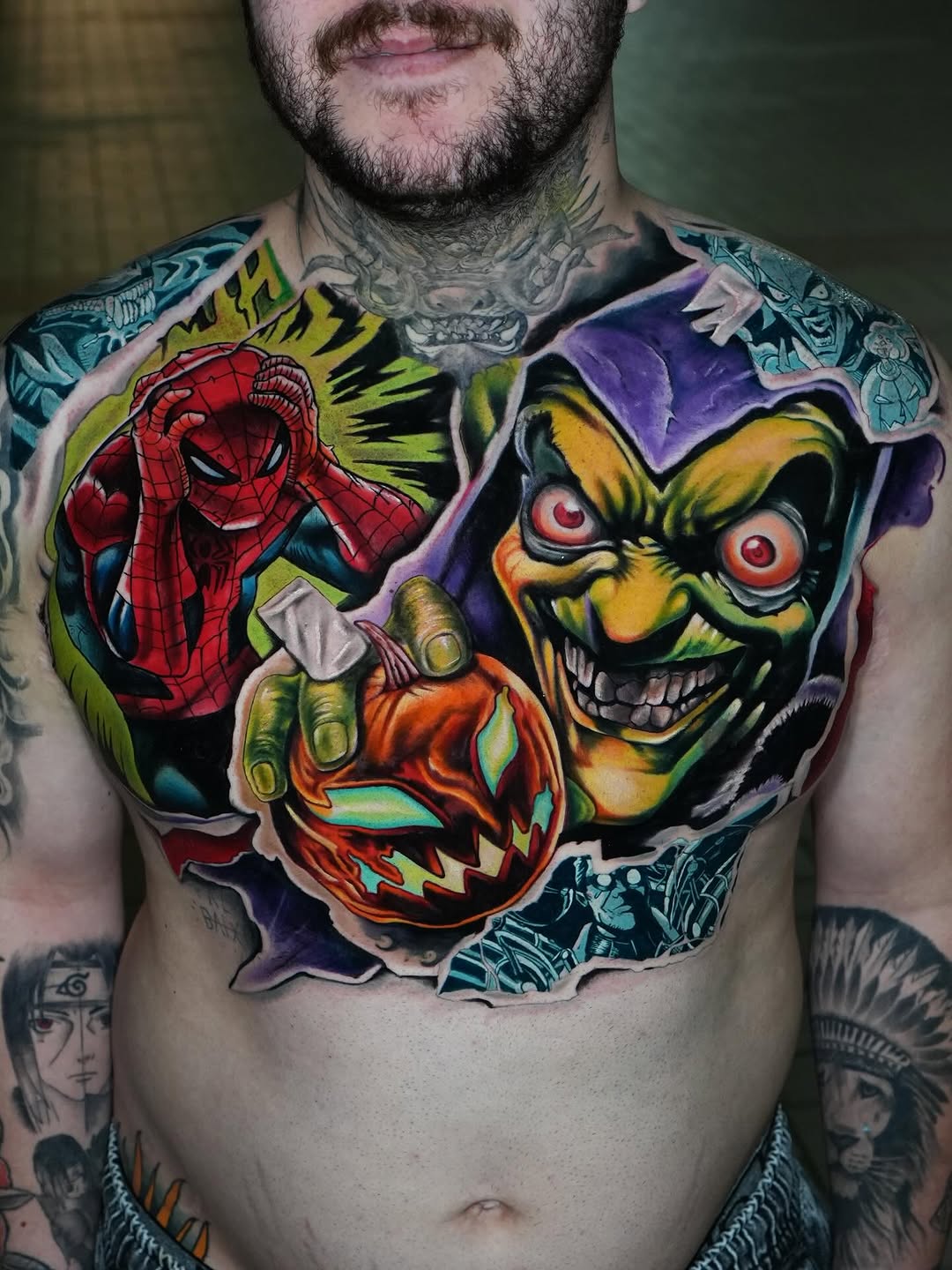 Vivid comic-inspired chest piece featuring Spider-Man and the Joker.