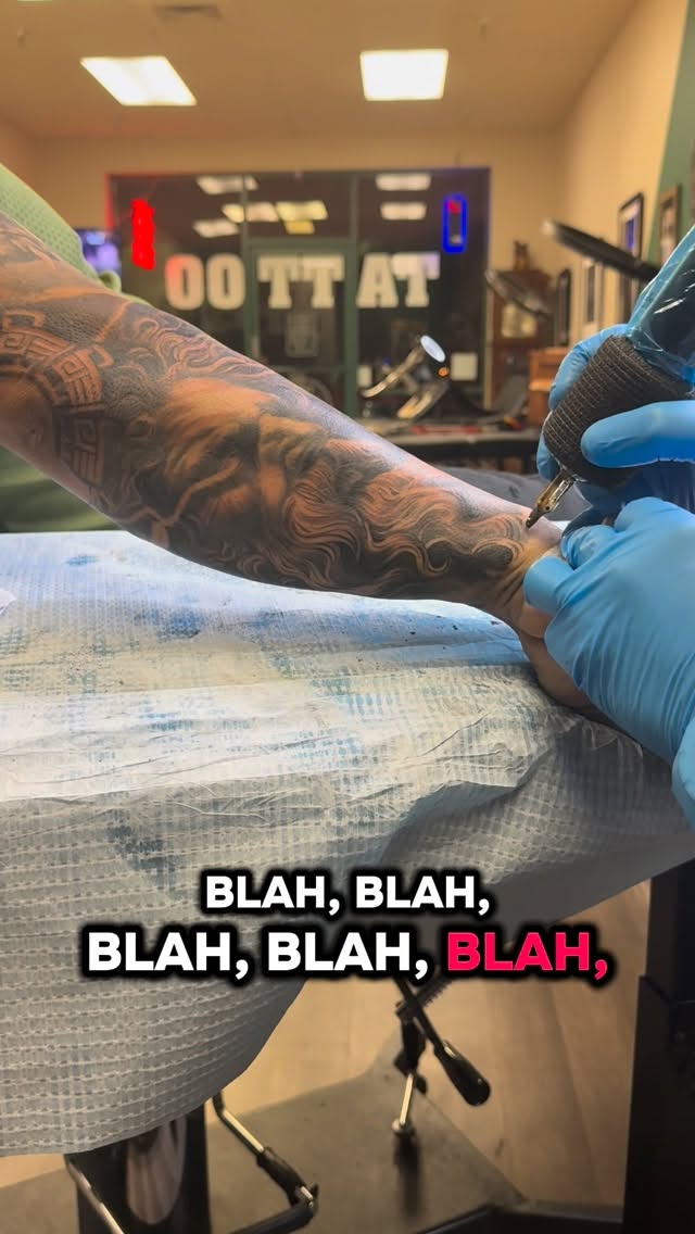 Intricate blackwork forearm swirl with wave-like motifs