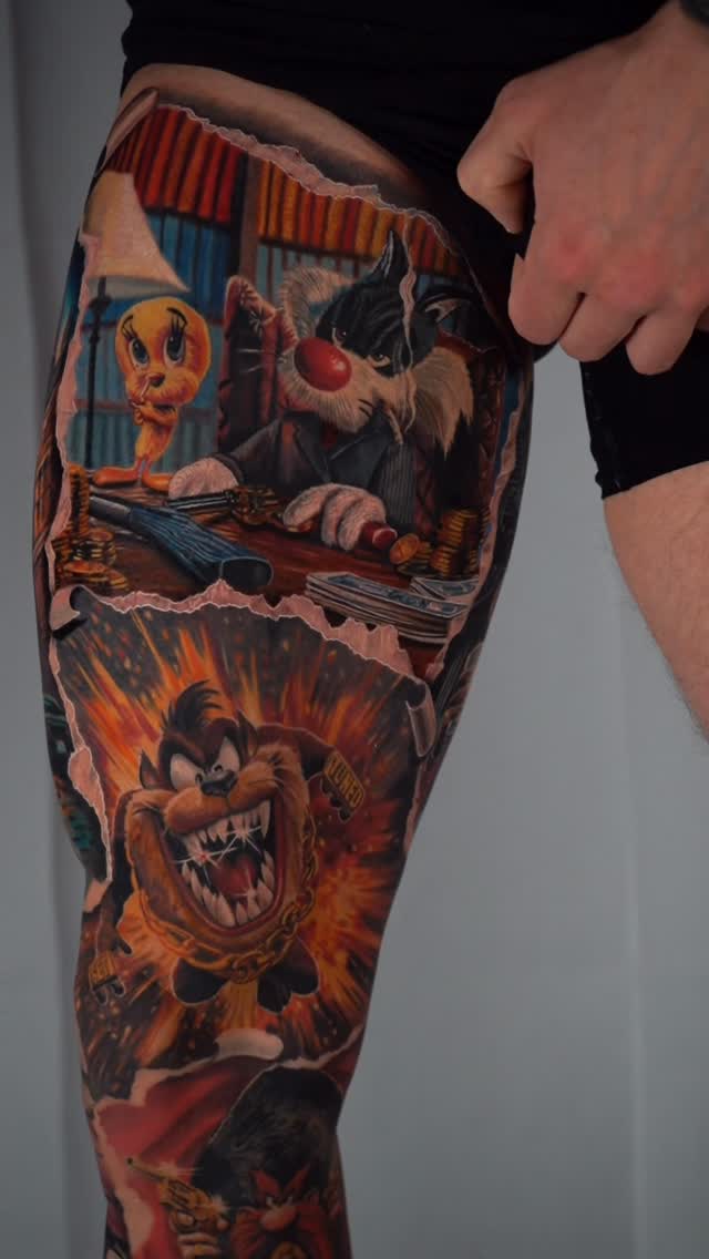 Vibrant torn-paper cartoon sleeve featuring Looney Tunes