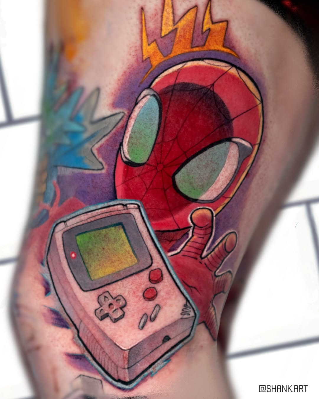 Vivid cartoon Spider-Man head with retro Game Boy.