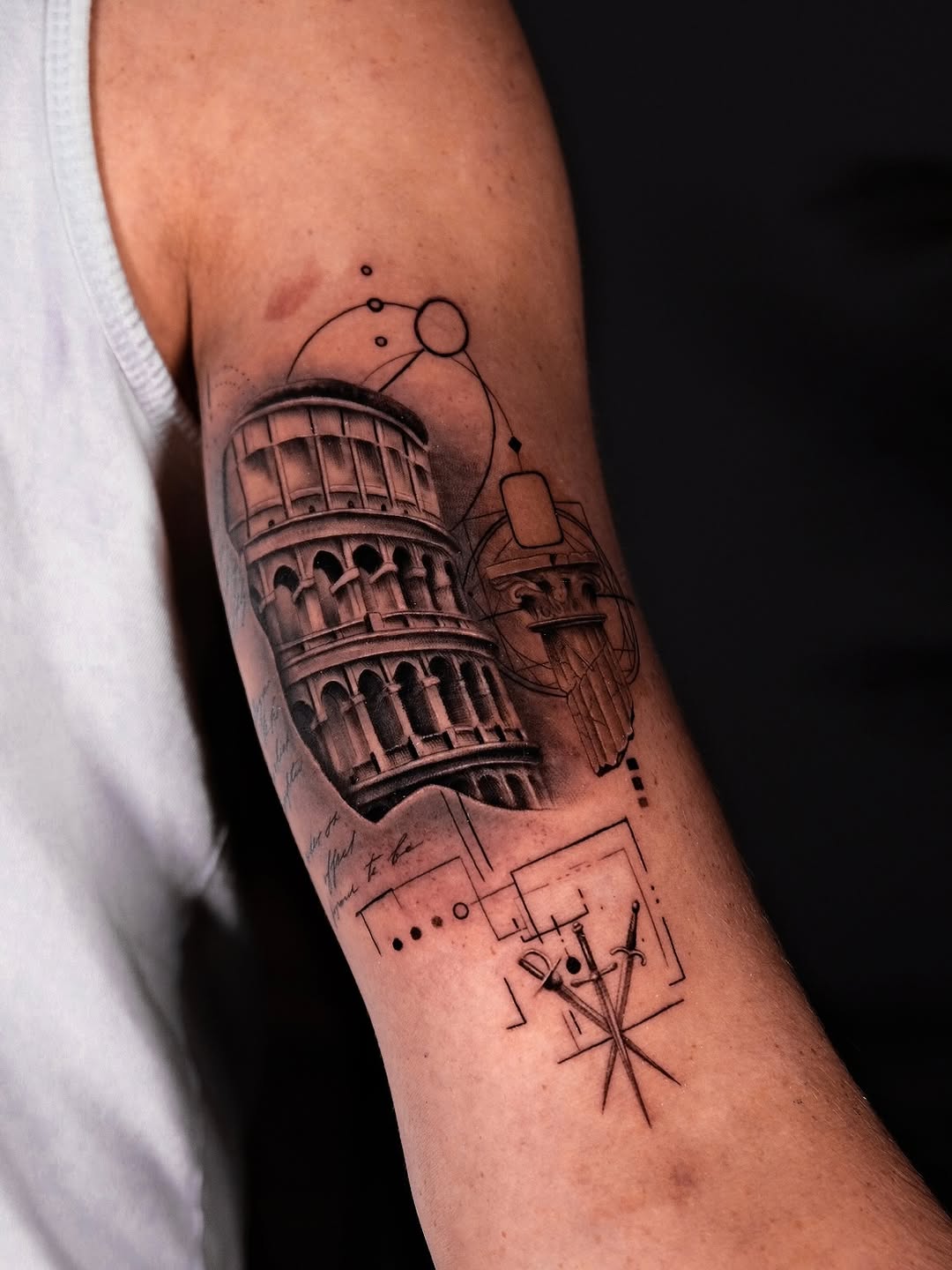 Architectural black-and-gray Colosseum with geometric blueprint accents.