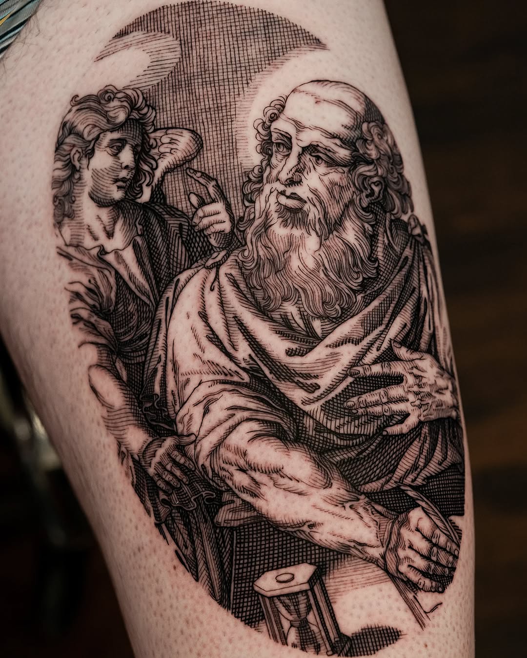 Engraving-style Saint Matthew with angel, bold linework