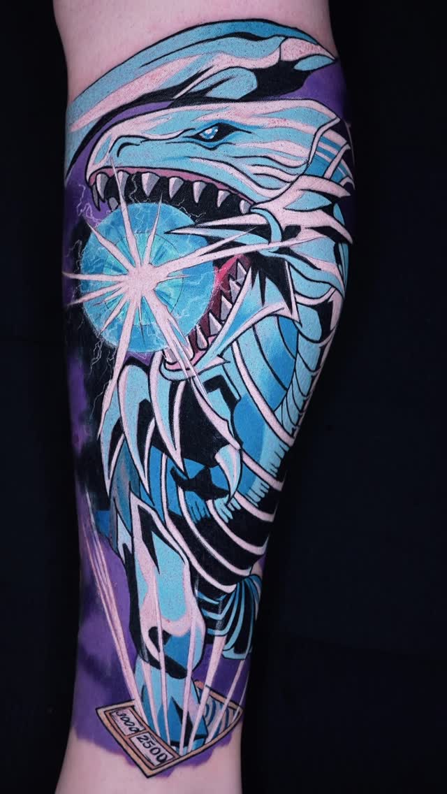 Vibrant anime Blue-Eyes dragon breathing electric-blue energy