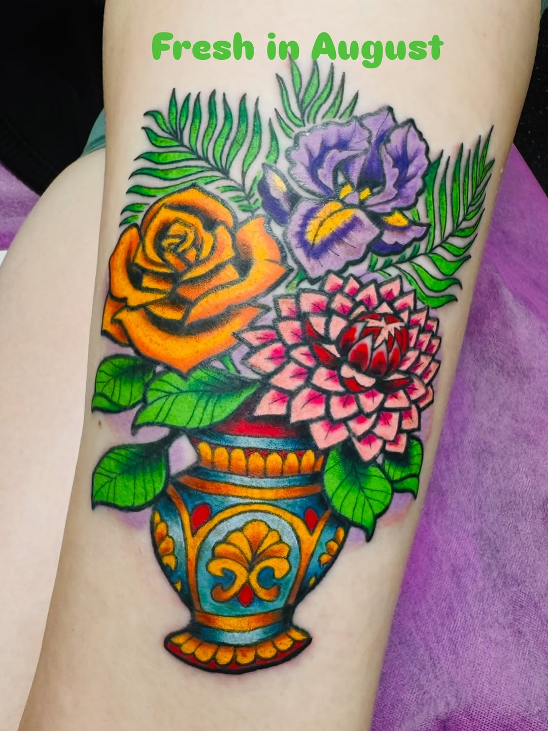 Vibrant neo-traditional vase bouquet with bold colors