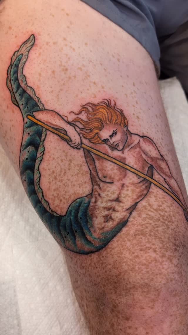 Vibrant neo-traditional merman with spear, bold lines
