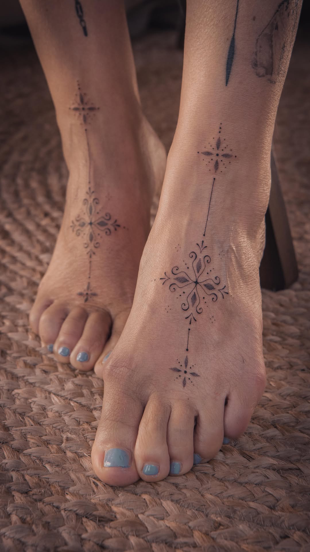 Delicate ornamental crosswork along ankles and feet.