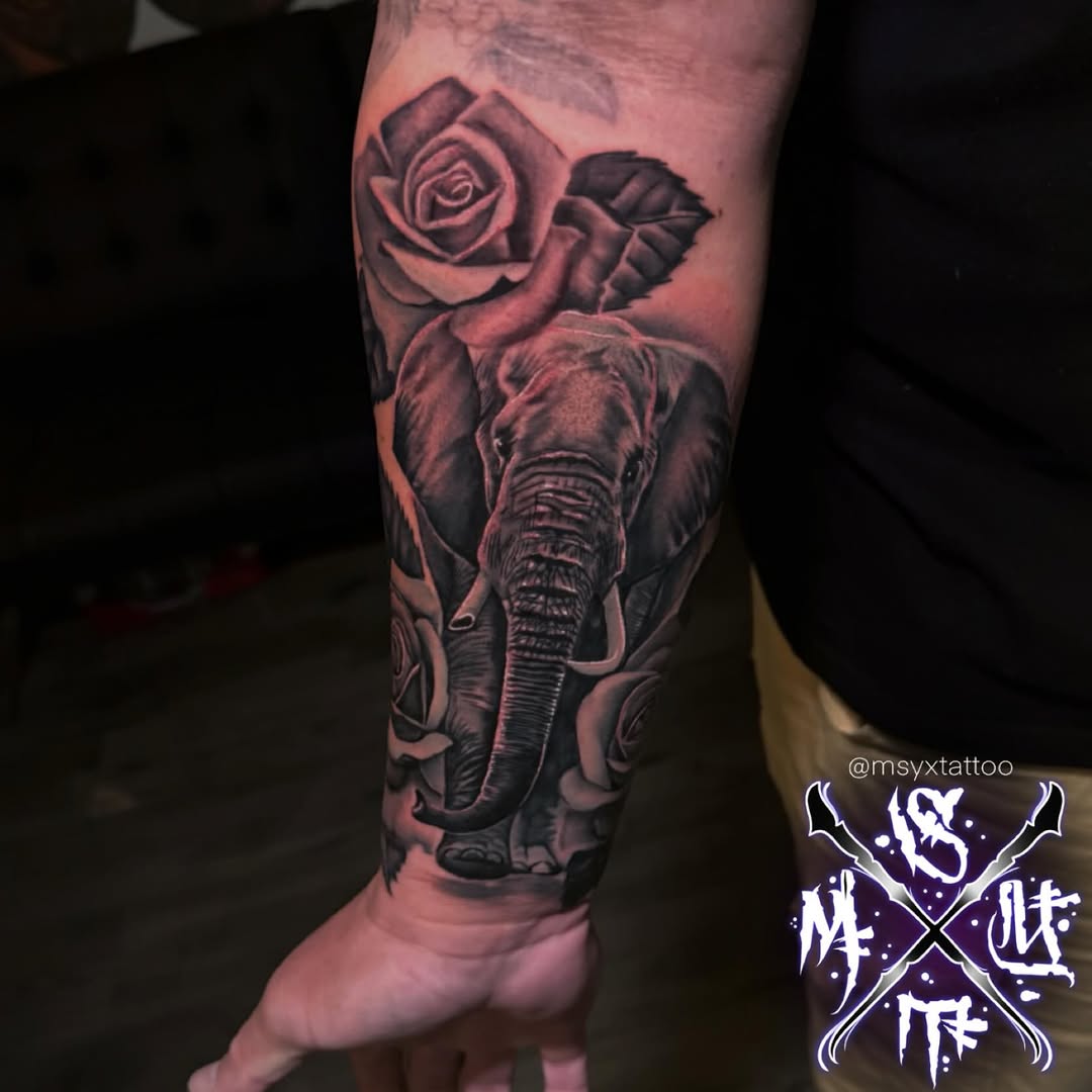 Hyper-detailed black-and-gray elephant amid blooming roses