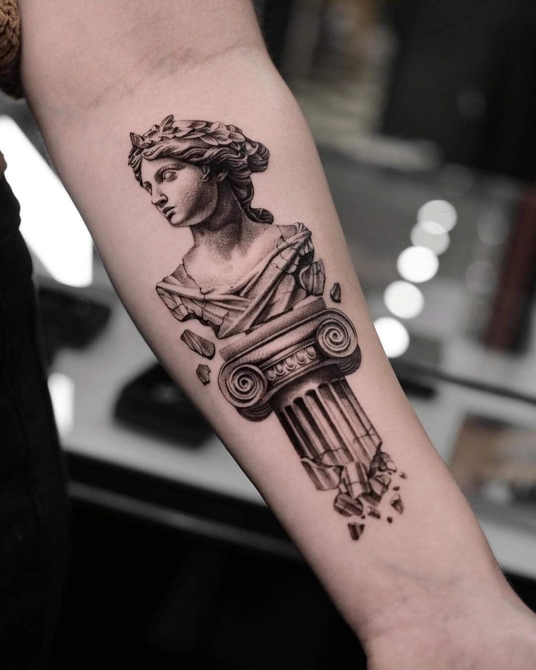 Neo-classical bust atop a shattered ancient column