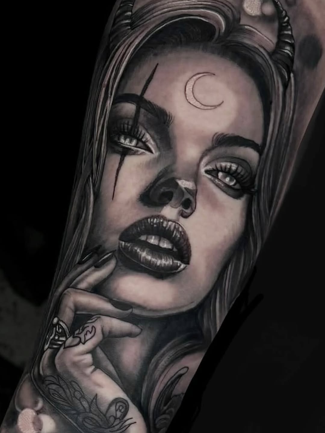 Monochrome realism portrait with crescent moon on forehead