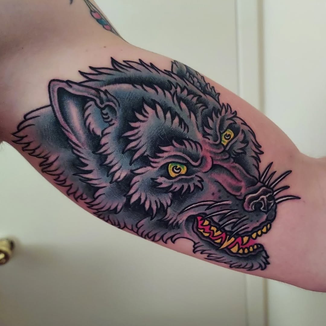 Bold wolf head portrait with heavy linework and purple shading.