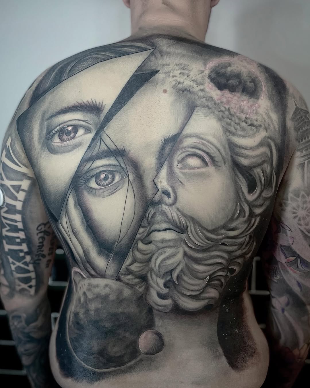 Monumental grayscale back piece, fractured face with sculpted bust