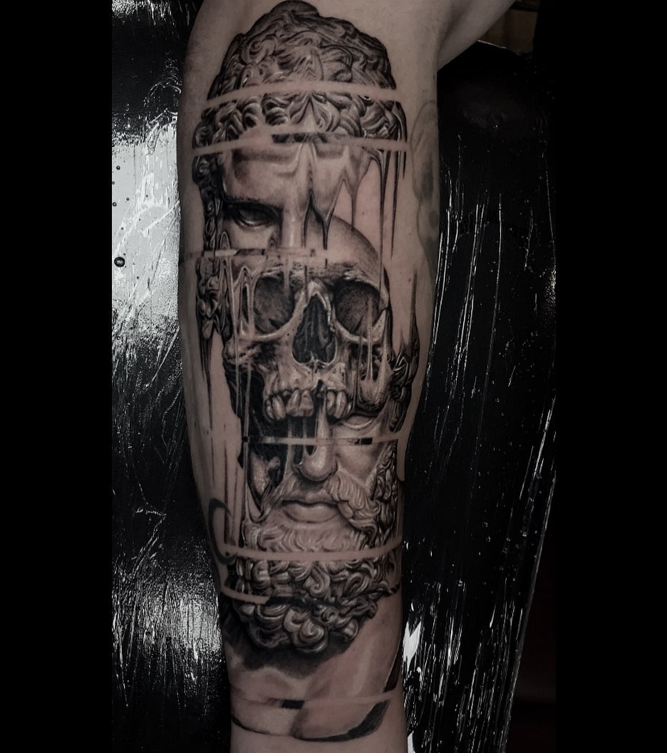 Large black-and-gray skull portrait with ornate bust