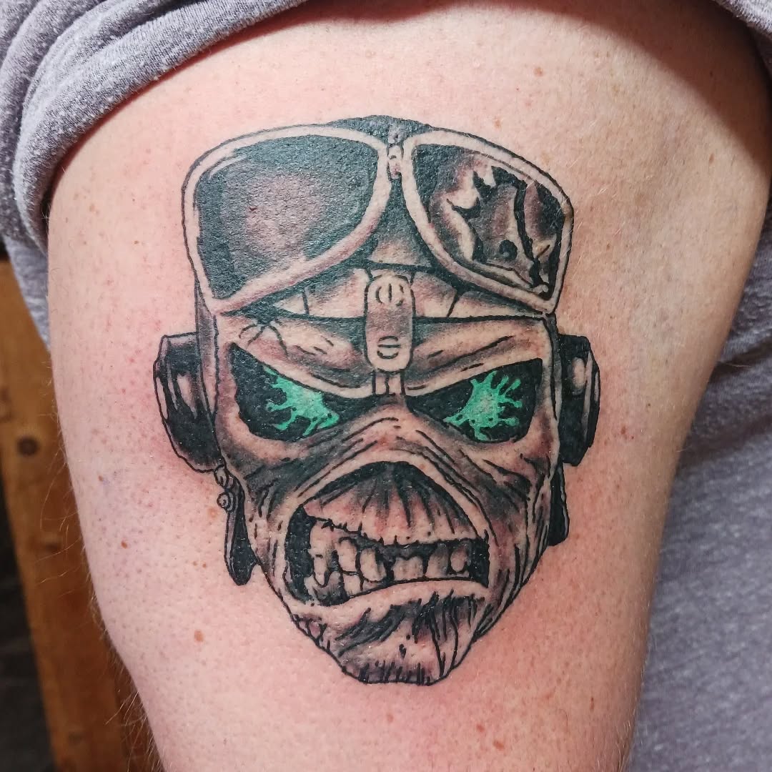 Iron Maiden Eddie-inspired skull helmet, bold lines, green eyes