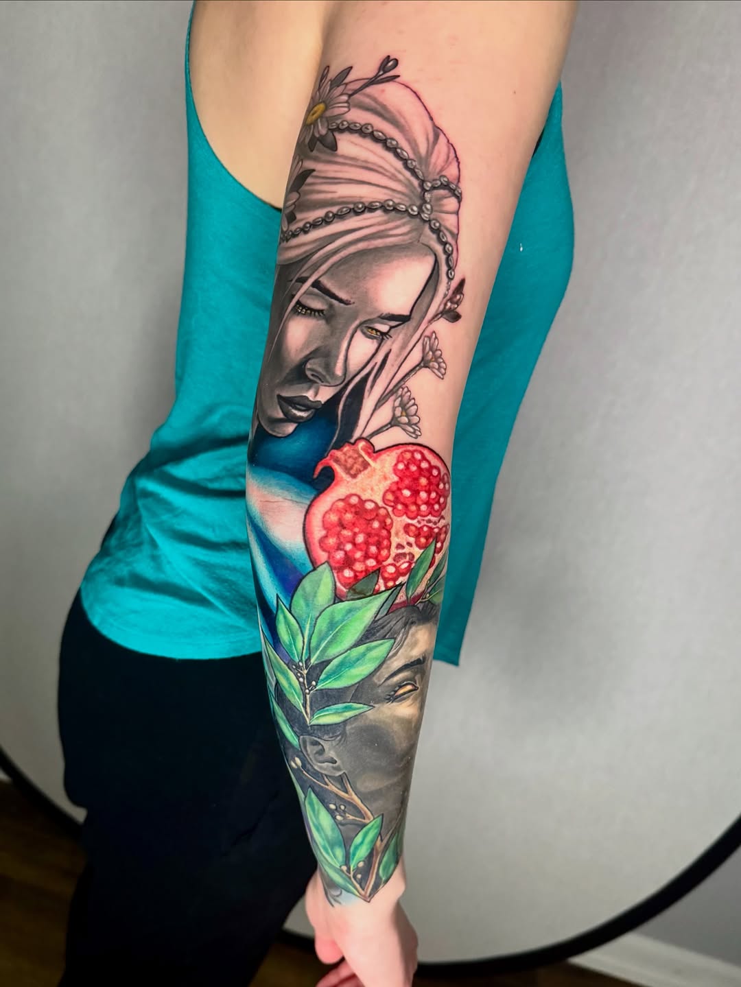 Mythic Greek goddess portrait with pomegranate and botanical accents.