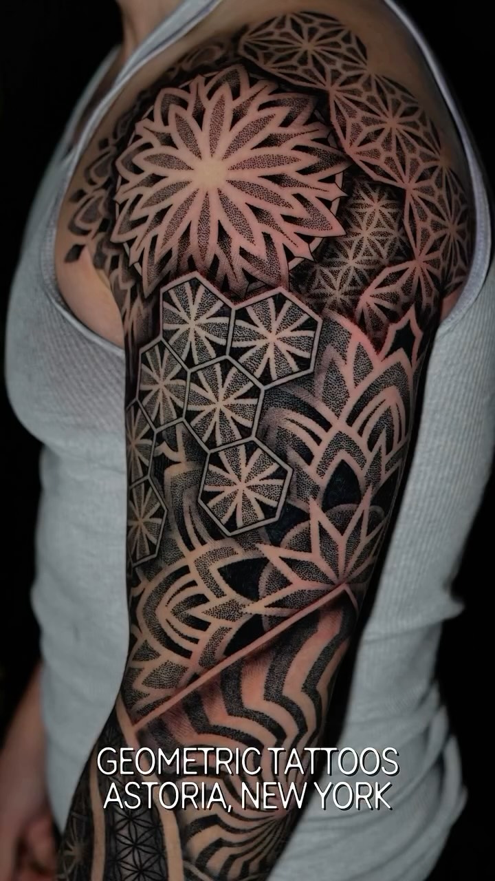 Bold geometric mandala-inspired sleeve with crisp dotwork shading