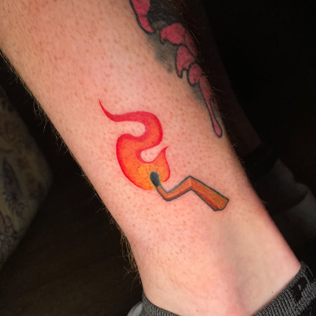Vibrant cartoon flame curling around a stylized match