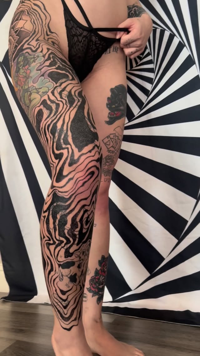 Hyper-detailed sumi-nagashi ornamental leg sleeve in black ink