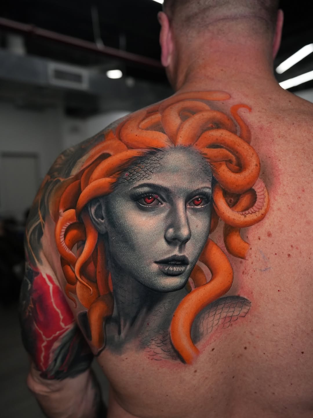 Color realism tattoo of Medusa