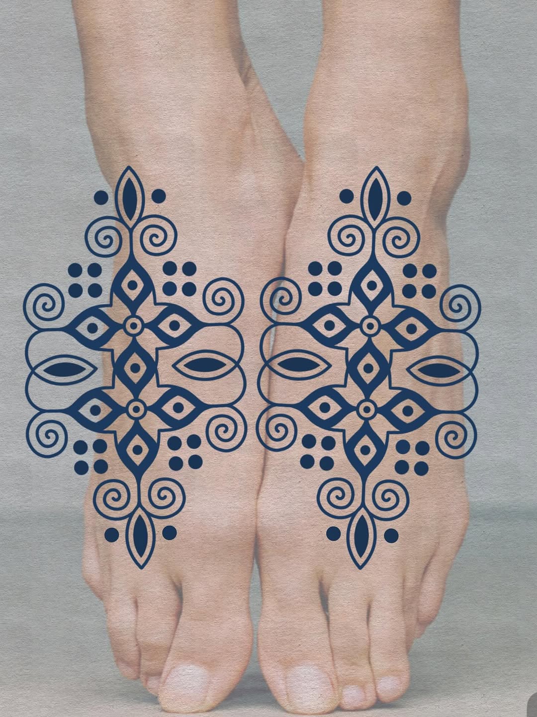 Symmetrical blue ornamental mandala motifs across both feet
