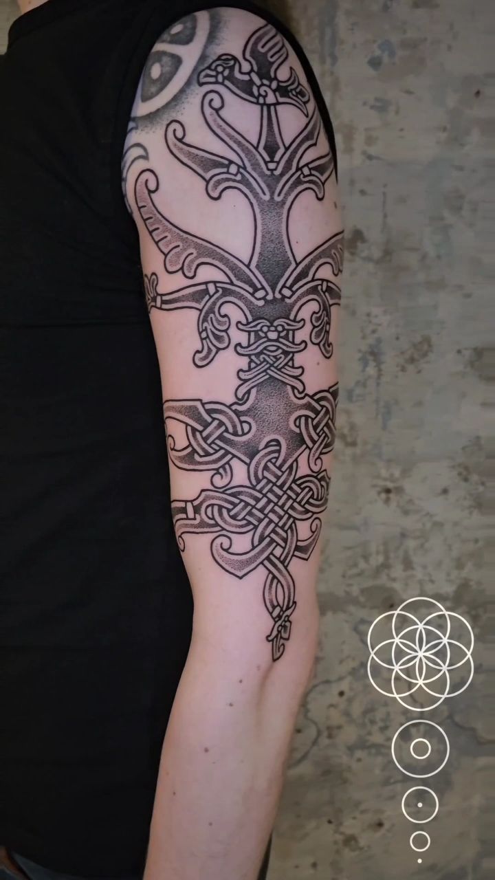 Intricate nordic blackwork Yggdrasil tree with knotwork.