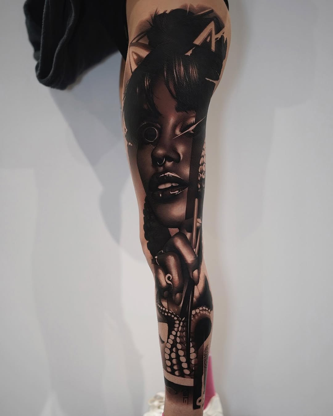 Hyperreal grayscale portrait of a woman with octopus tentacles