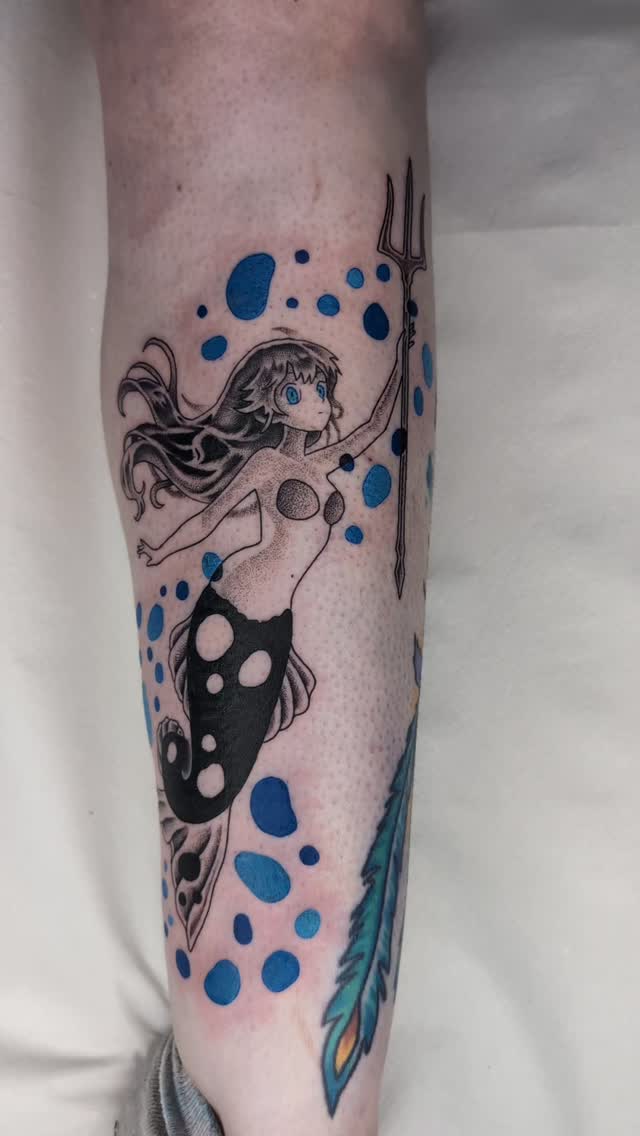 Anime mermaid with trident, bold linework, blue watercolor splashes