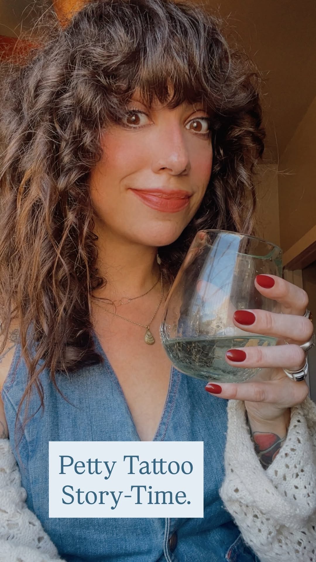 Warm portrait highlighting a subtle forearm tattoo