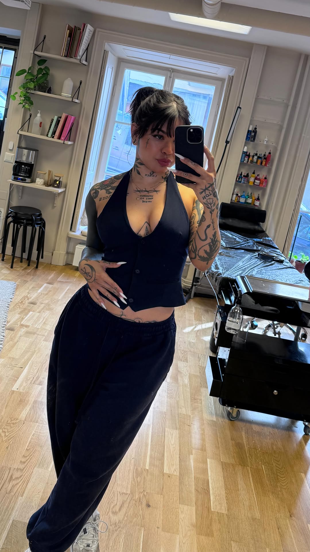 Bold blackwork with geometric triangles and botanical vines