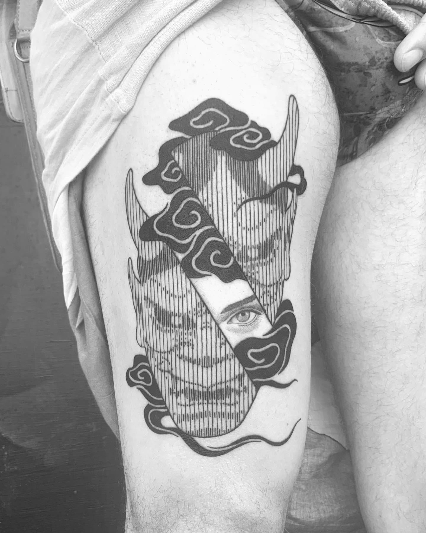 Bold Hannya mask with cloud motifs and striped shading