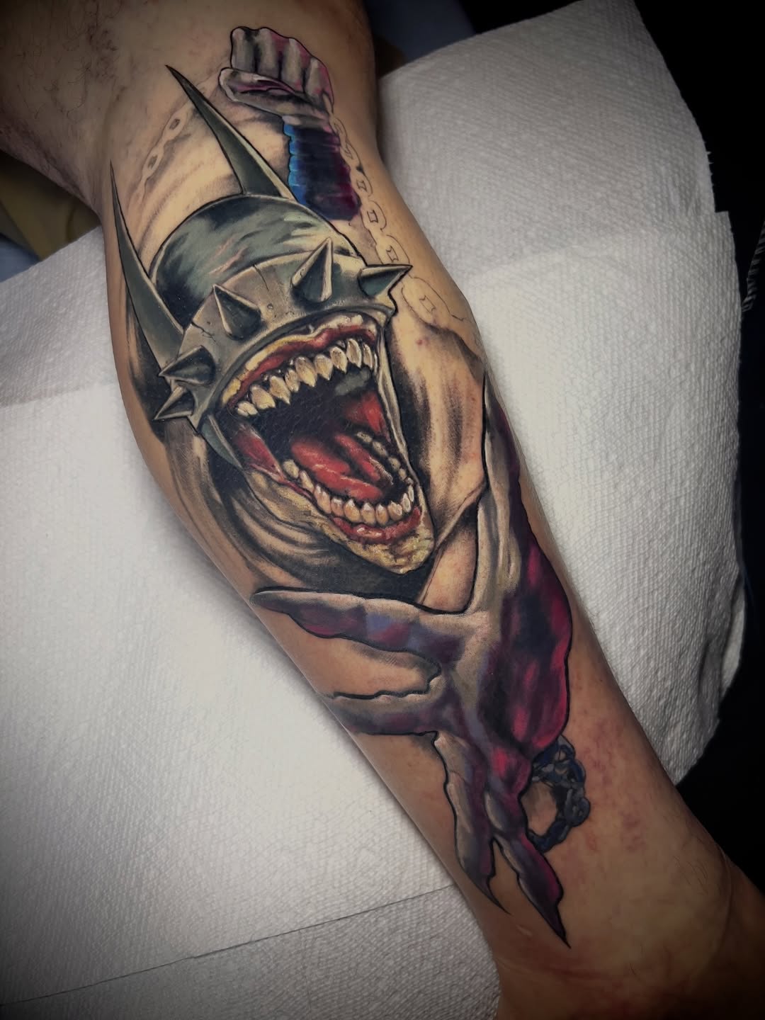 Massive Batman Who Laughs beast portrait with spiked helmet.