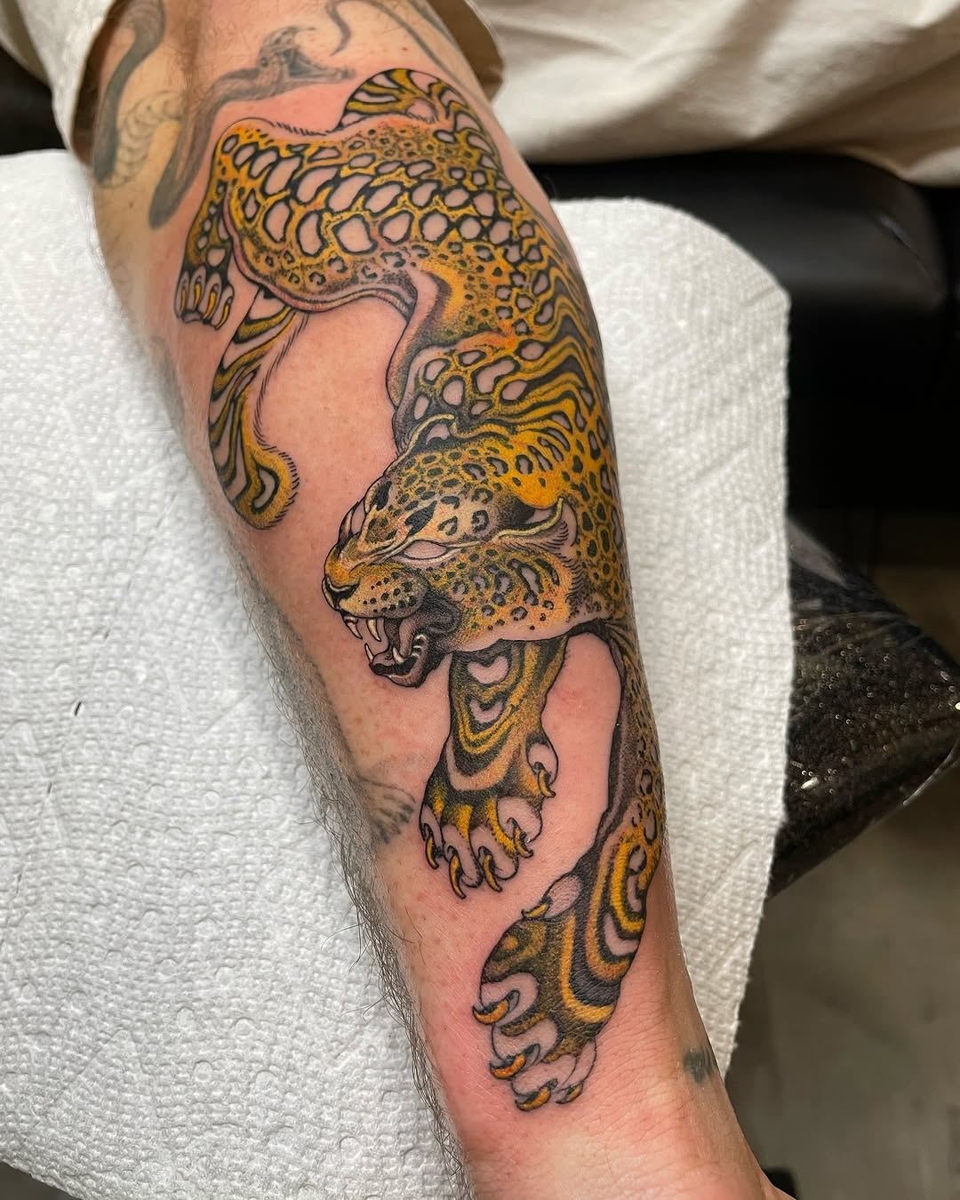 Colorful leopard tattoo