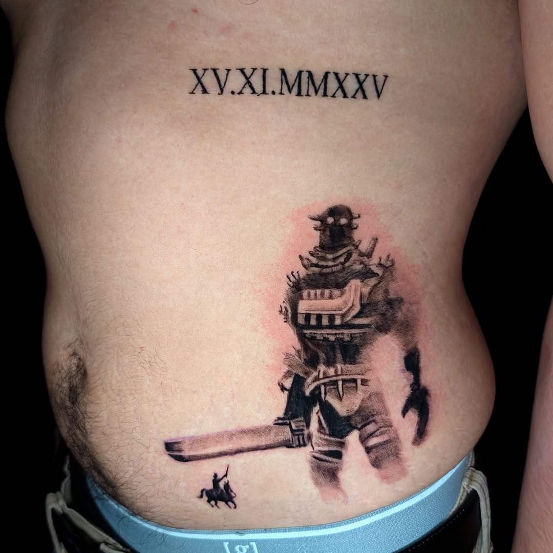 Shadow of Colossus-inspired blackwork titan on ribcage