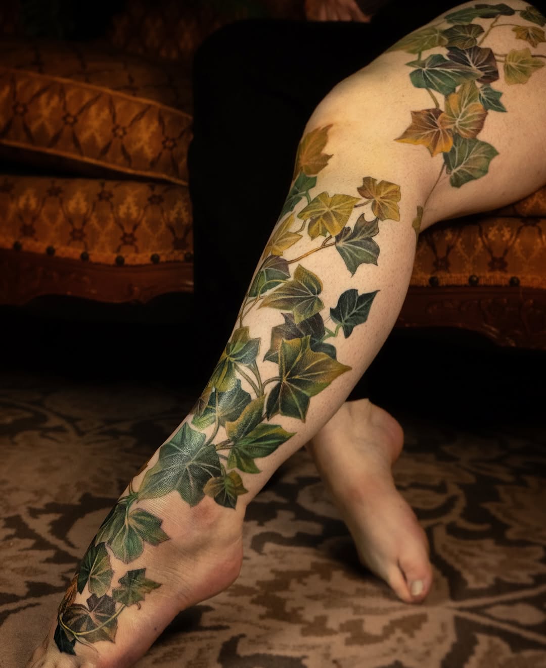 Vibrant ivy vines wrap the calf in lush greens