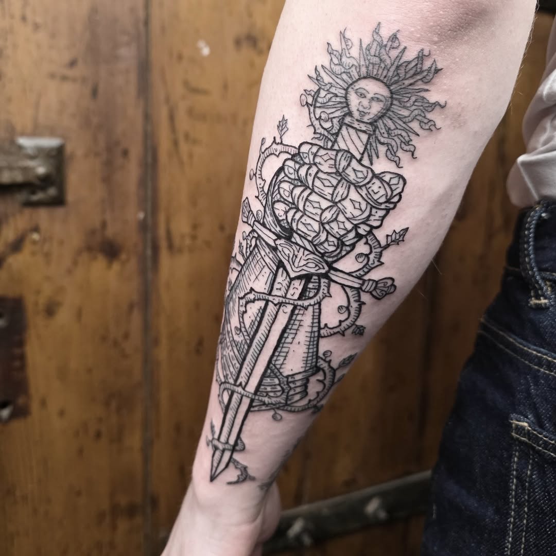 Engraving-inspired sword and sun motif with bold linework