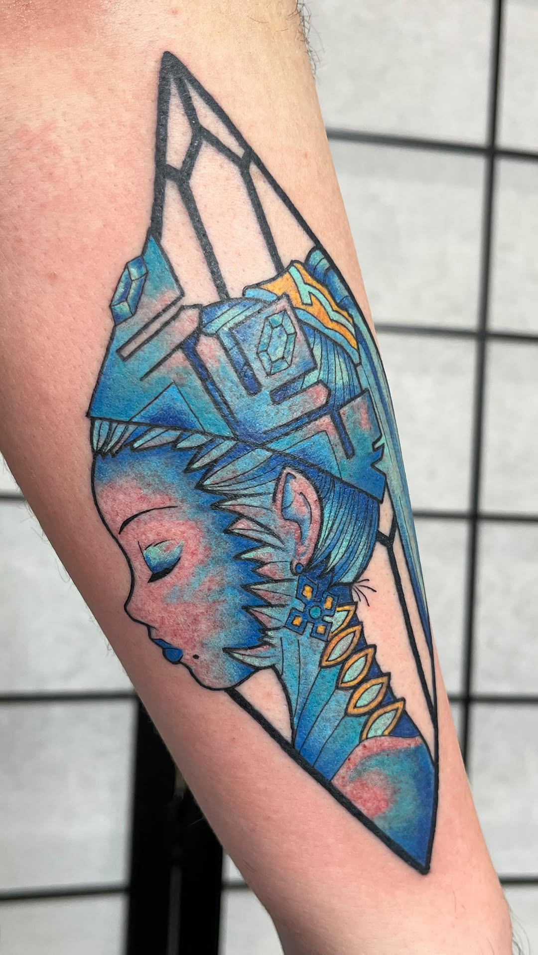 Geometric blue Shiva profile with crystalline headdress