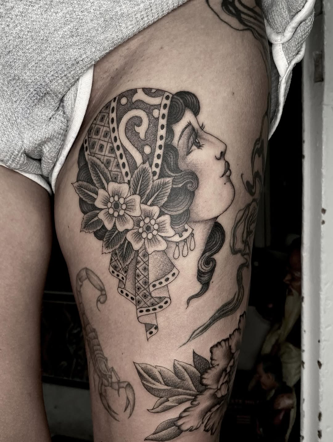 Graceful profile portrait with blooming florals and ribbons.