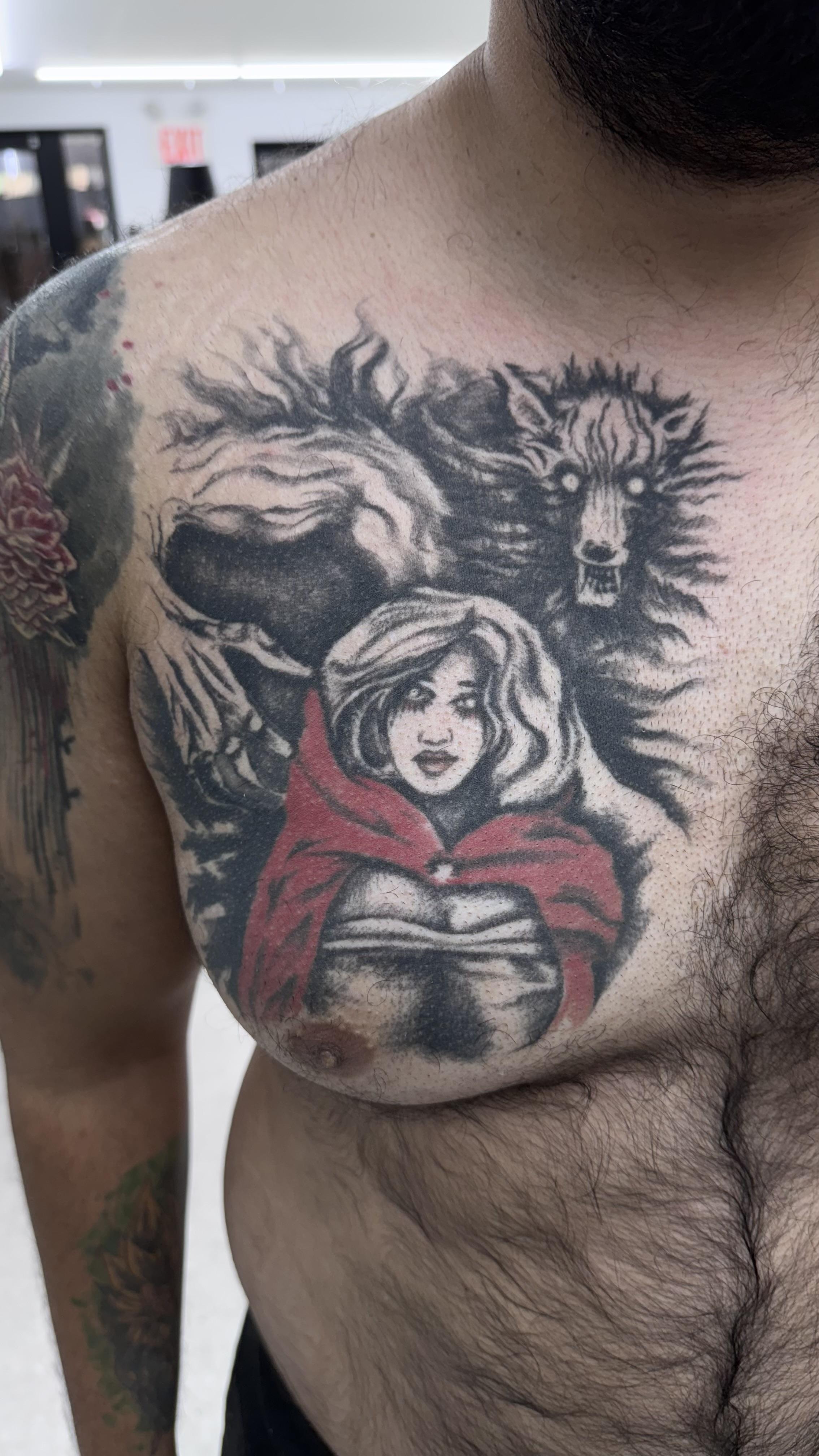 Bold grayscale Red Riding Hood with a menacing wolf